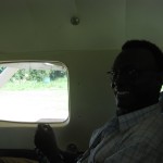 Fred Taban on board the plane to Entebbe