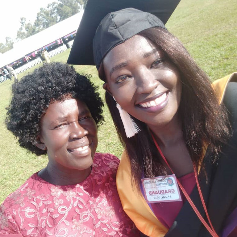 Beatrice graduating in July 2019 with her mother