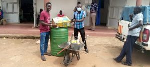 Agric officer handed over clinic garden equipment to Ivan Kenyi at the clinic