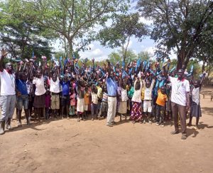Group Photo at Goboro Bush area With Rev. Lomena Alfred and Murye Emmanuel - Countless words of appreciation were given to the Diocese of Liwolo and its Donors
